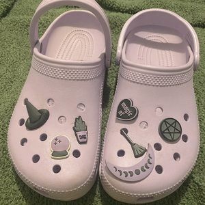 Lavender crocs with witchy charms